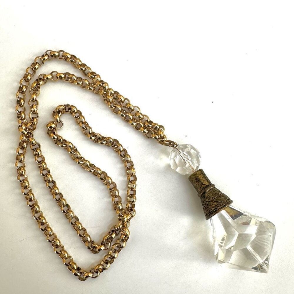 Clear pendant gold tone necklace